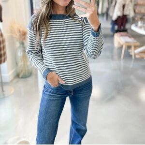 Blue and white striped staccato sweater